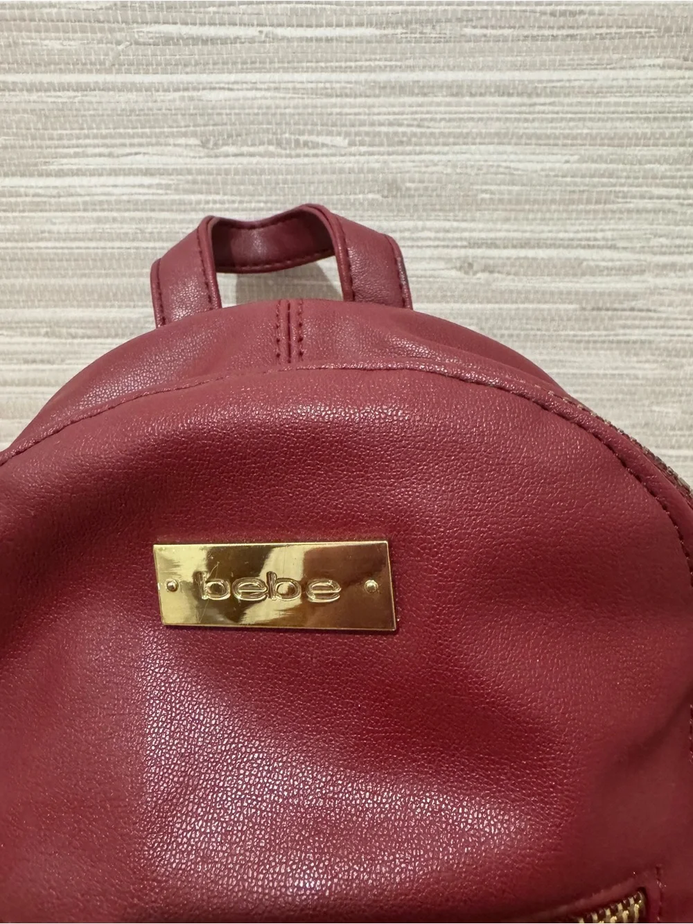 bebe Small Quilted Backpack in Burgundy with Gold Chain